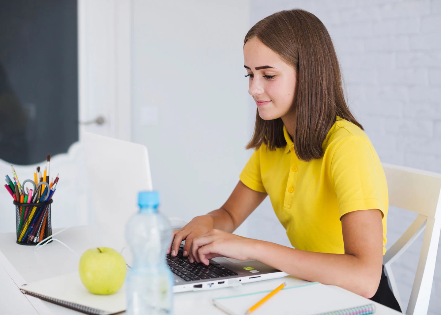 Young student enjoying working